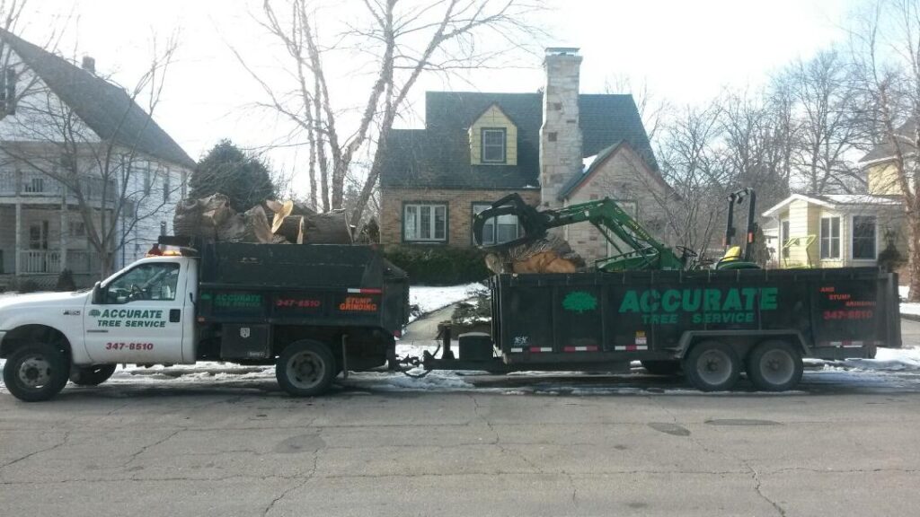 Accurate Tree Service Truck with trailer in residential neighborhood